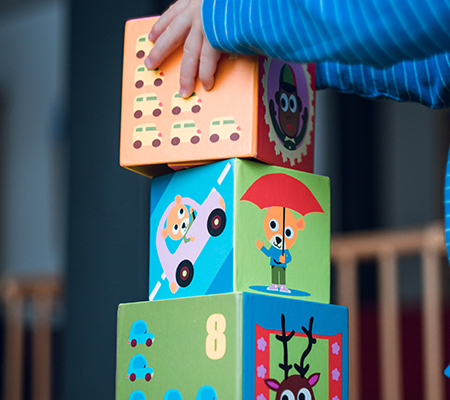 Boys' and Girls' Toys: How do they Stack Up, and Who does the Stacking? 
