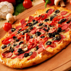 Pizza with sausage and olives